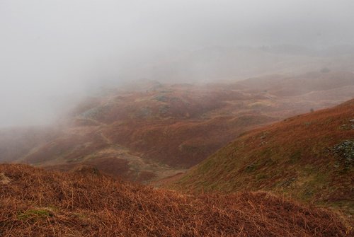 Misty view from Loughrigg Fell - towards Rydal water
