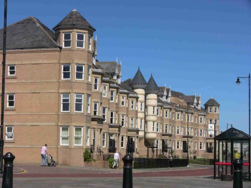 A row of homes in front of Gibraltar Rock