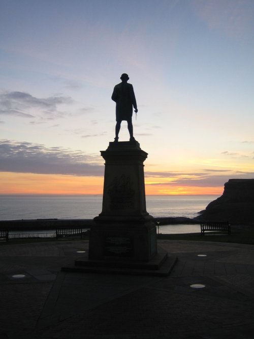 Captain Cook looks for the rising sun.