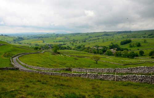Malham Rakes in June, looking down Malhamdale towards the village of Malham, Yorkshire