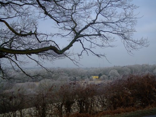 A cold winters day with a sunshine house