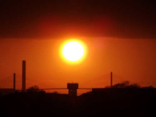 Sunset over Kimberly Clarks water tower