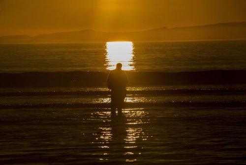 Fisherman at Sunset - Llandanwg beach.