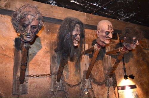 Prisoners heads on poles.