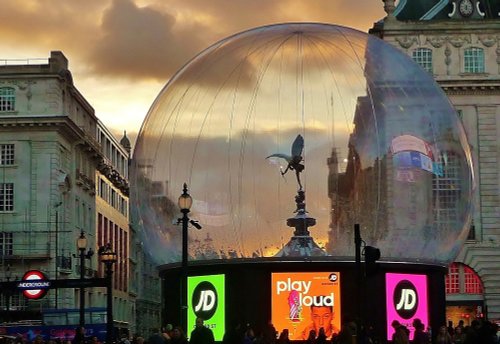 As evening falls on Piccadilly Circus.