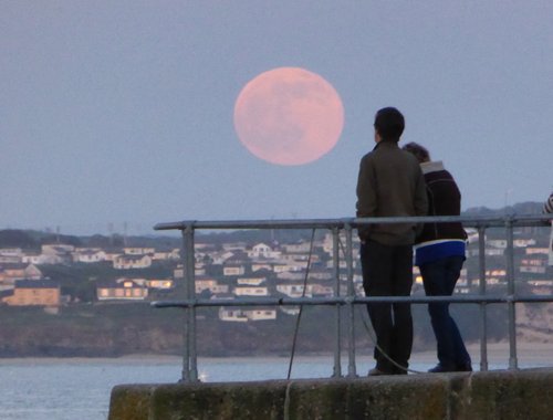 The Moon rising over West Pier, St. Ives, Cornwall.