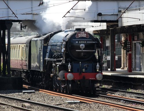 Tornado steam train passing through Lancaster, Lancashire