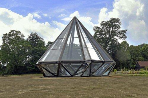 A new  ten-sided ‘kinetic’ glasshouse at Woolbeding Gardens