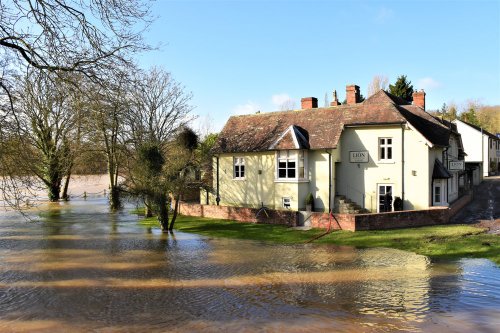 The Lion Inn in Leintwardine by the River Teme in flood.