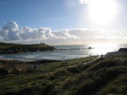 In the evening, looking down at a submerged Summerleaze beach when the tide is in