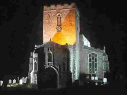 Debenham Church lit up in a late spring evening. Debenham, Suffolk.