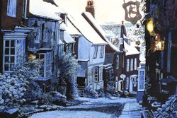 Painting of Mermaid Street, Rye, in the snow by Colin Bailey