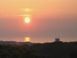 Sunset over Cromer, Norfolk, taken from 14th fairway of Royal Cromer Golf Course.