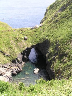 The Devil's Frying Pan, a spectacular coastal feature near Cadgwith, the Lizard, Cornwall.