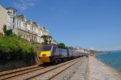 Dawlish promenade and red cliffs with first Intercity 125 - June 2009