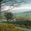 Looking from the brow of Pasture Lane over Roughlee towards The brooding Pendle Hill, Lancashire