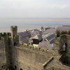 Caernarfon Castle, part of the town and Anglesea accross the menai Strait. May, 2006