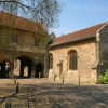 Abbey Gateway and the chancel of St Nicholas Church, Abingdon, Oxfordshire.