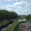 Twelve step lock stairway in Oldbury, West Midlands, carrying canal beneath M5 near junction 2.