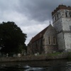 All Saints Church alongside the river Thames in Bisham, Berkshire - August 2006