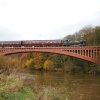 Steam train over the Victoria Bridge at Arley
