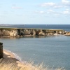 The beach and cliffs at Marsden Bay.