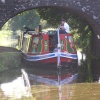 Horse-drawn barge near Tiverton, moored under a bridge