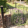 Cockington village in Devon  The iron gate