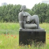 Woman And Fish Statue