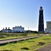 The Old Lighthouse & the Circular Lightkeeper's House Next to Dungeness Nuclear Power Station in Kent.
