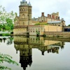 The Gothic Tower Reflecting in the Lake.
