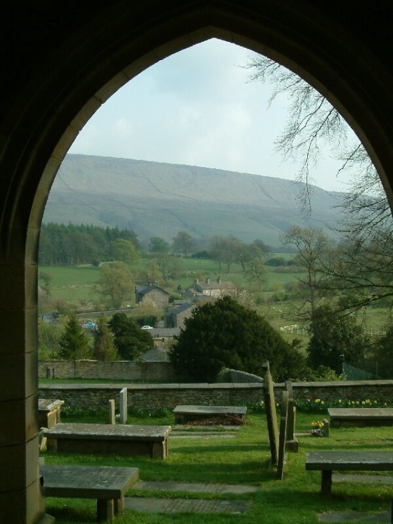 View of Pendle Hill from door of Downham Church