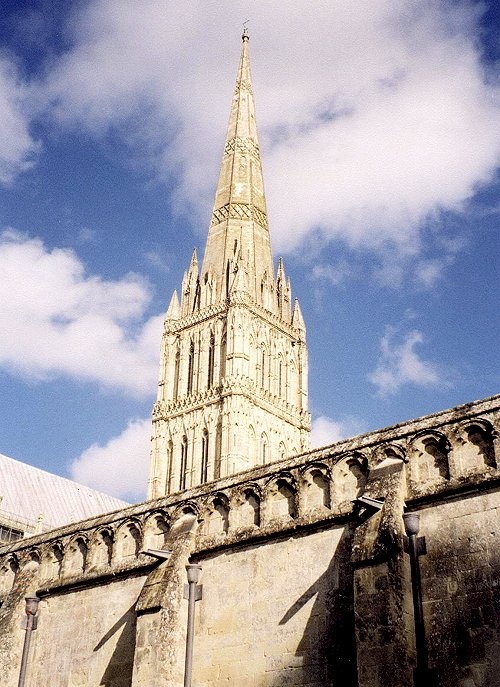Salisbury Cathedral Spire towering above the Cloisters west wall