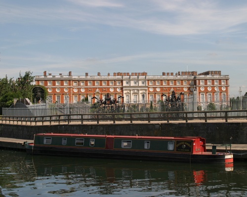 Photograph of Hampton court bridge and mitre inn hotel from the thames