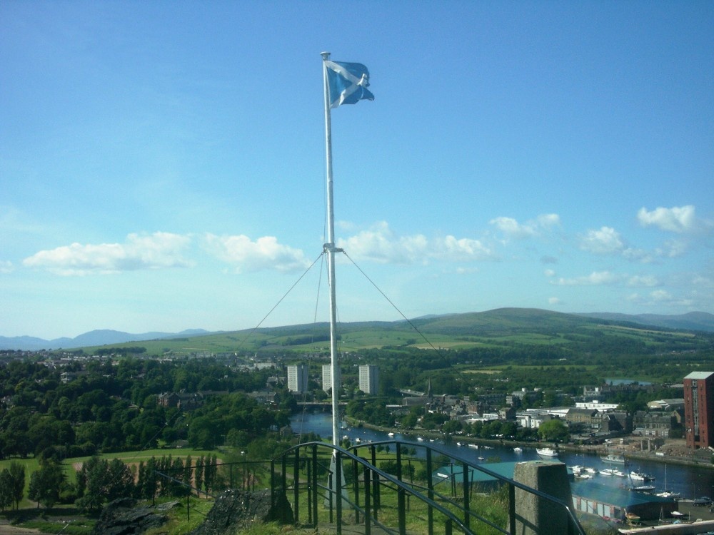 The flagpole at the tip of the rock