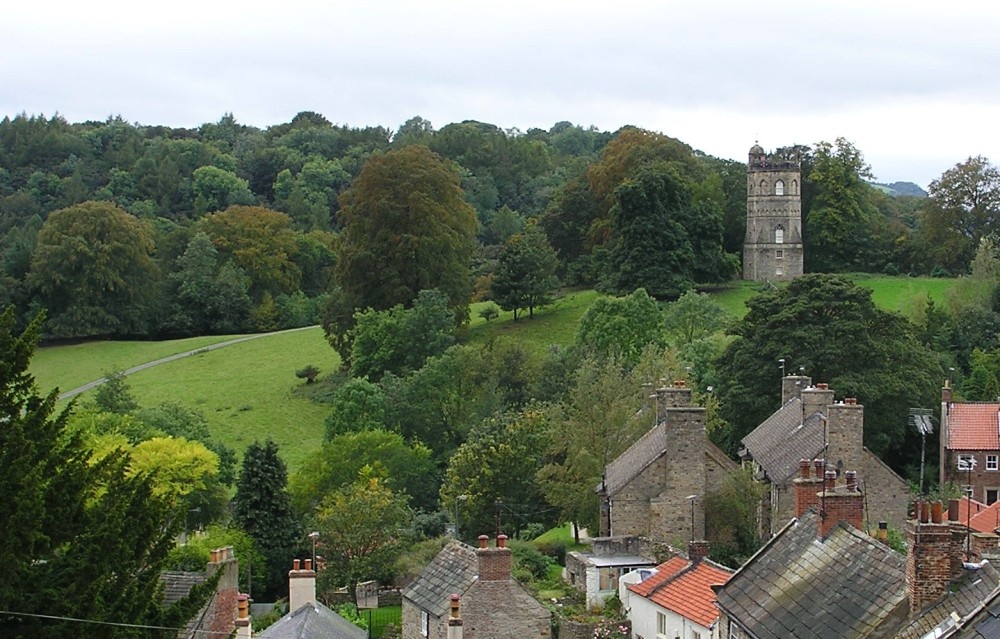 Overlooking roof tops to a distant folly, Richmond, North Yorkshire