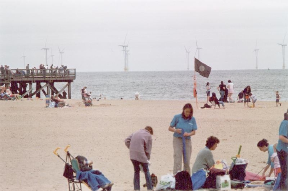 Great Yarmouth Beach, Norfolk including Scroby Sands windfarm in the background