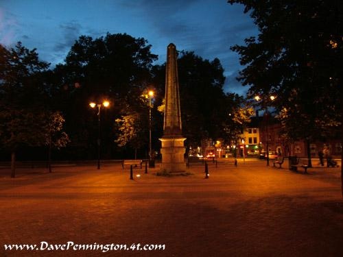 Night shot of Leigh Town Square.