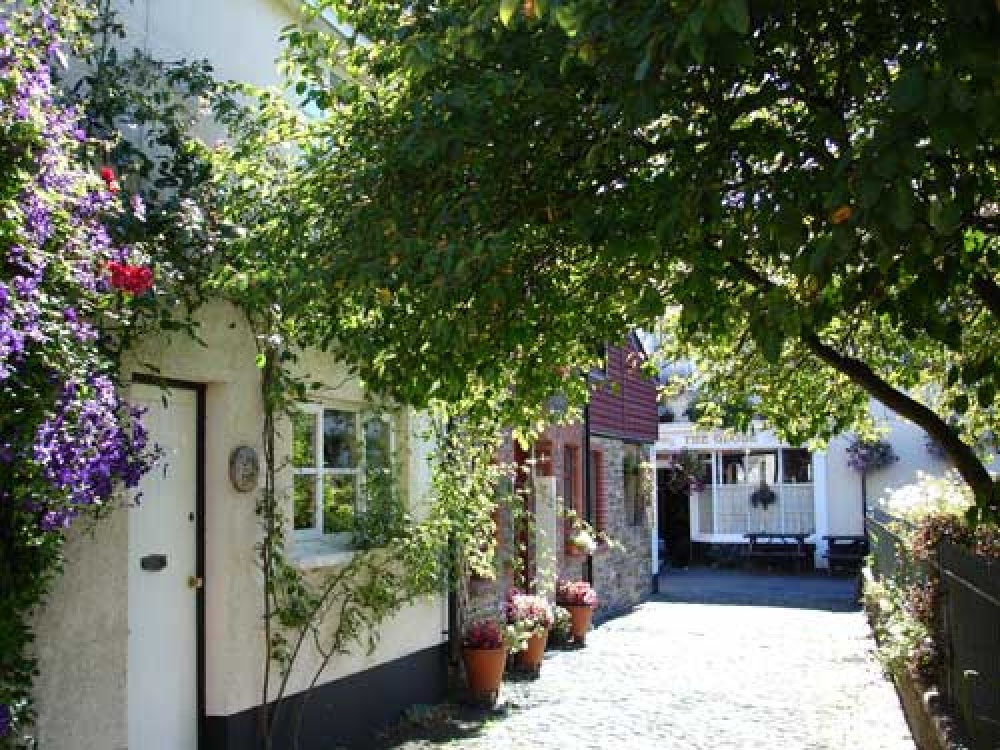 A side street in the centre of Chulmleigh, Devon, dressed for Summer