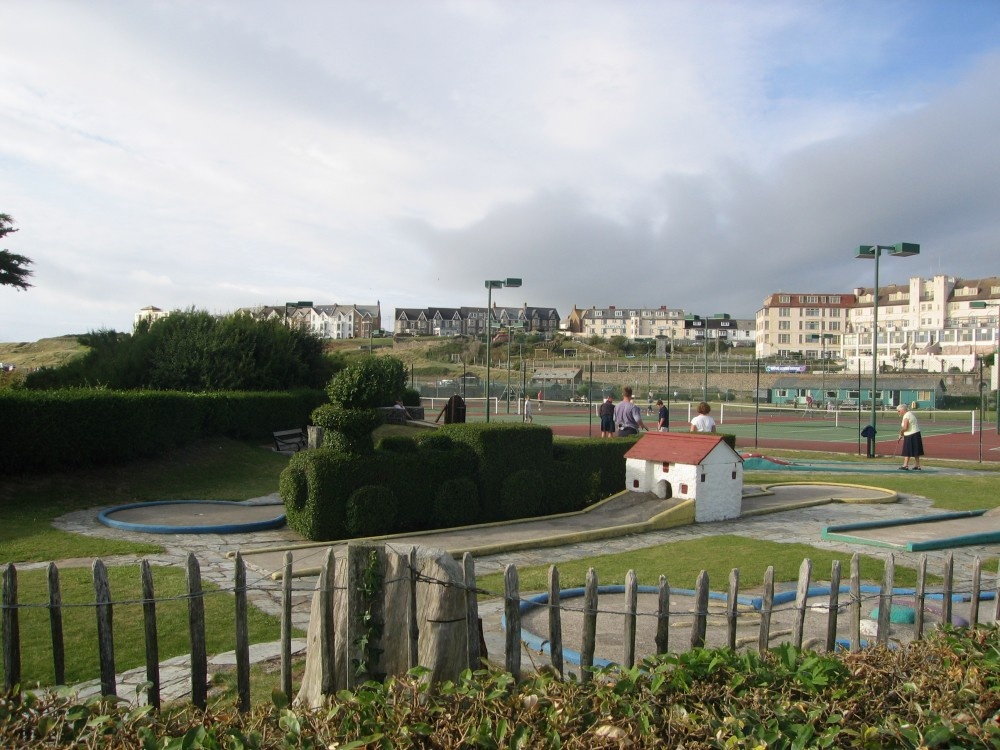 Bude. Tennis courts and crazy golf complete with ornamental hedge in shape of a train.
