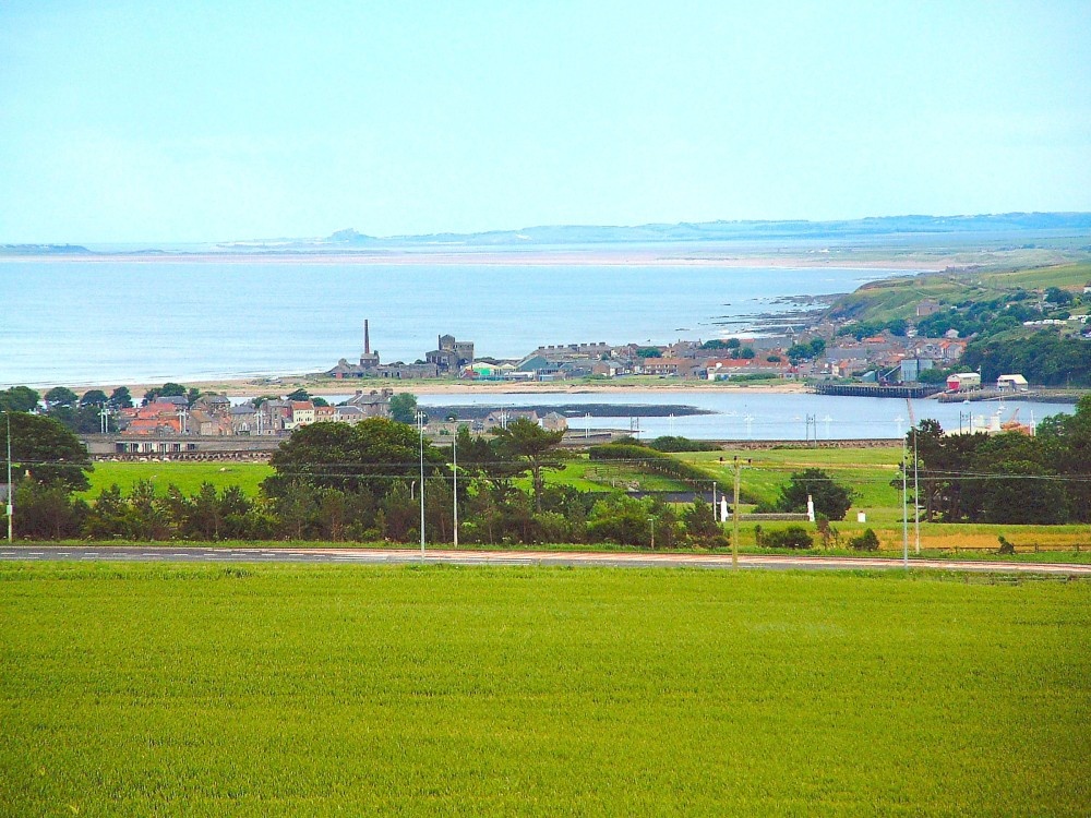 Photograph of Berwick upon Tweed and distant Bamburgh Castle