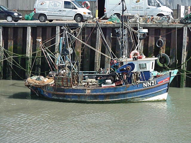 Fishing boat in the harbour. Whitstable, Kent