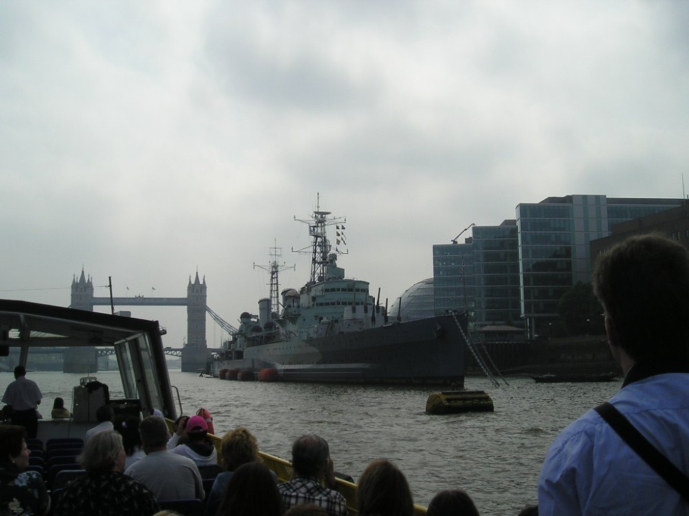 On the Thames in London. HMS Belfast with Tower Bridge in the background.