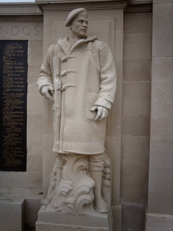 Stone carved Marine on the Navy War Memorial, Southsea Common.