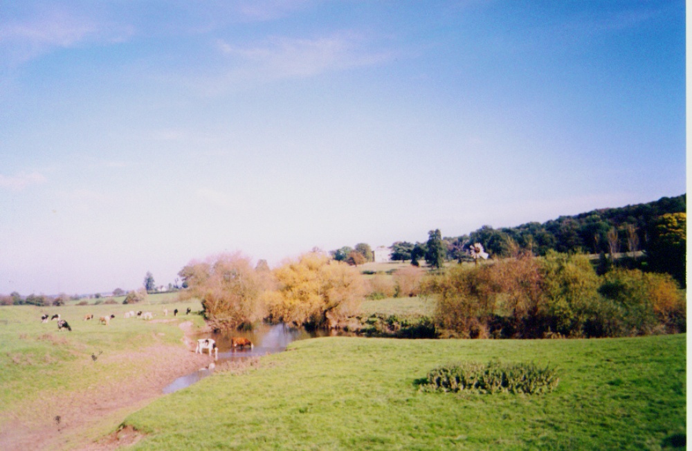 view across the River Lugg to Sufton Court. Mordiford, Herefordshire