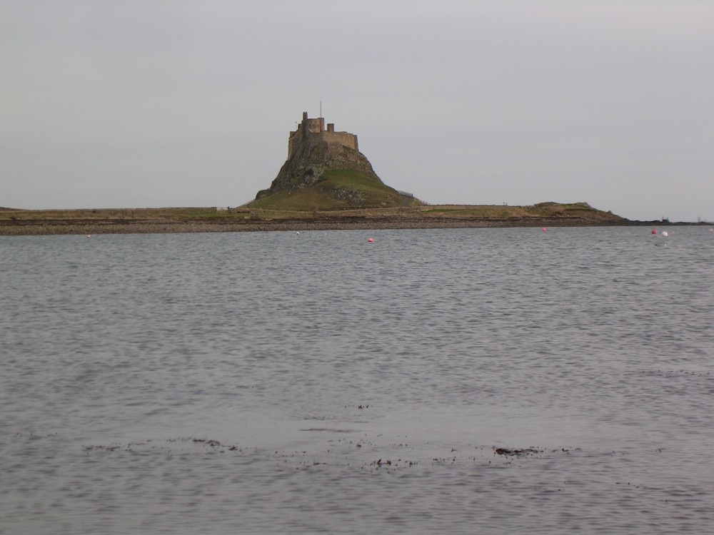 Lindisfarne Castle from the harbour beach.