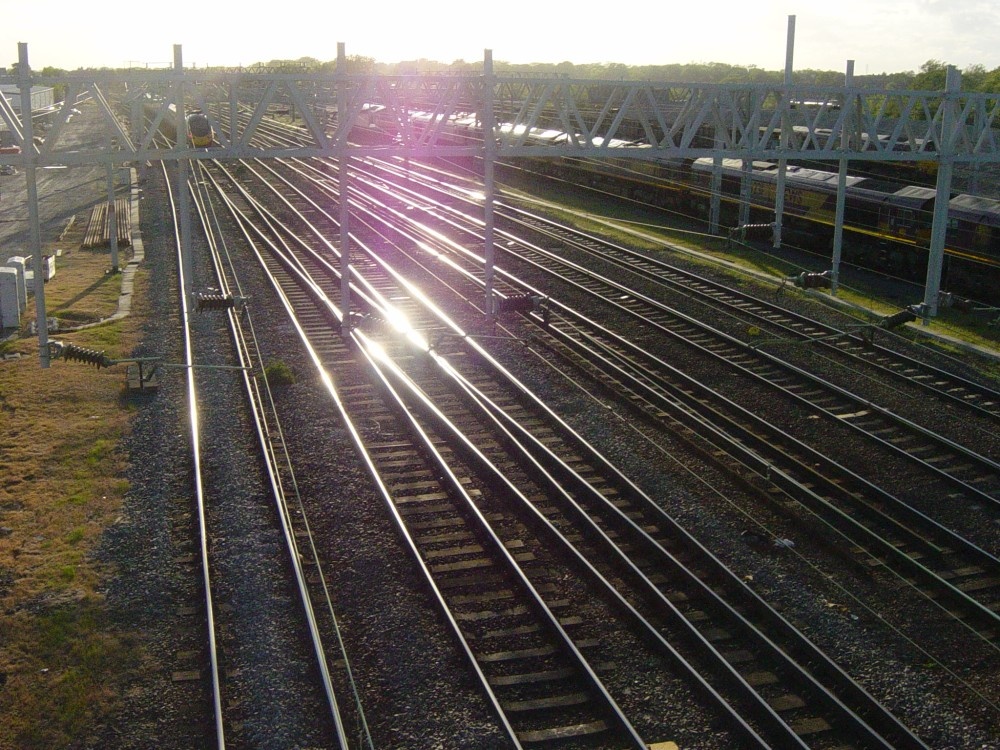 Looking west on the West Coast Mainline railway west of Rugby train station.