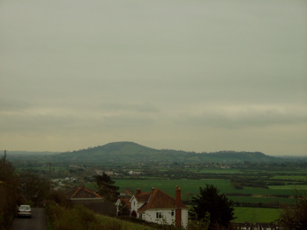 Photograph of Brent Knoll hill taken from bleadon village, Somerset