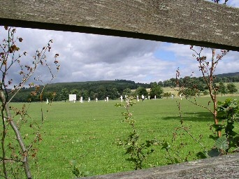Saturday cricket on a warm afternoon.yorkshire dales