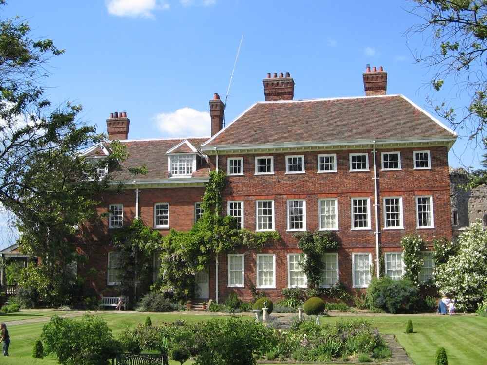 Photograph of This is a photo taken last summer of the side view of Benington Lordship house and its Rose Garden.
